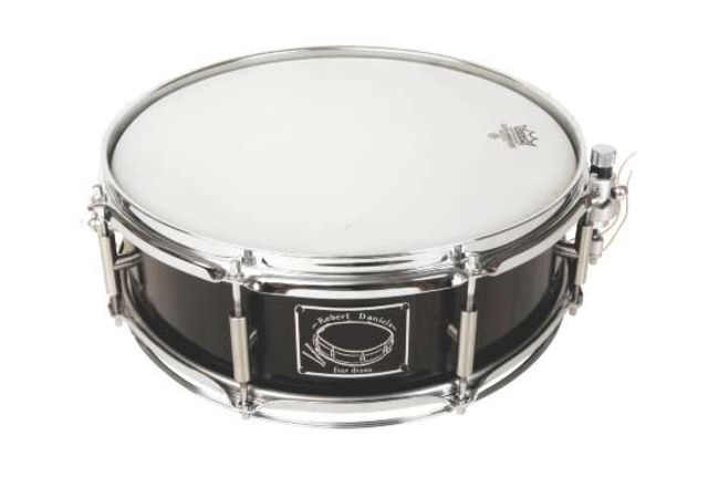 blank The bog oak snare is the only standard size drum here, showing the flexibility of Fine Drums